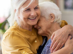 Woman spending time with her elderly mother