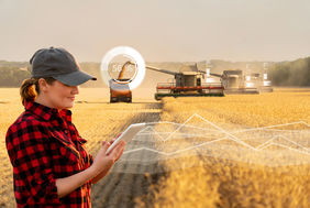 Woman farmer with digital tablet