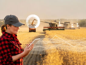 Woman farmer with digital tablet